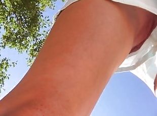 Up skirt. Teen girl in short shorts without panties. Pussy close-up. Hidden camera in the Park