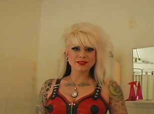 Kinky latex mistress abuses a guy