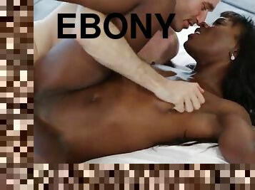 Appealing ebony with small tits getting drilled in interracial sex
