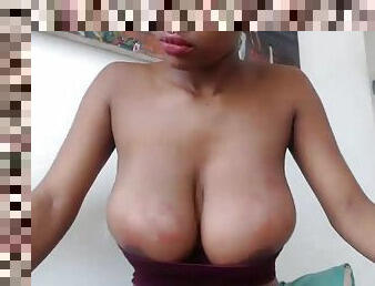 Black slut showed her big tits and pussy