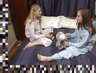 Cute lesbian girls karina and Alya on the bed