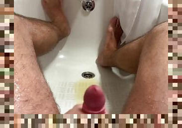 girl peeing on his dick while he jerks off