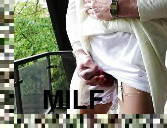 Milf masturbates in a transparent pleated dress