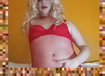 Crossdresser Felixa in red fishnet riding dildo masturbating