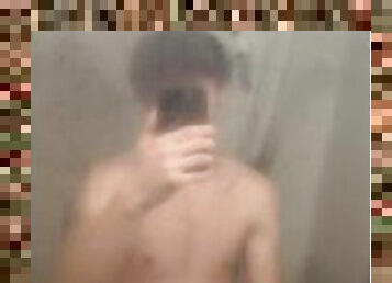 Cute teen jerks off before shower