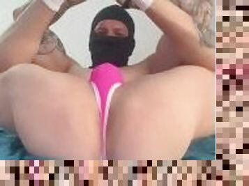 muscular bear wearing pink thong and mask and play with his hole and dildo