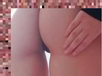 Beautiful girl wiggles her ass on camera