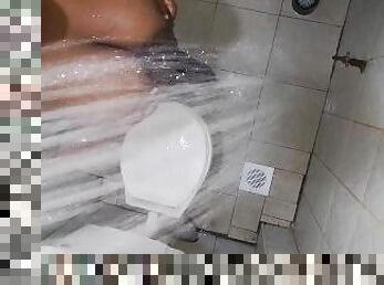 Kenyan hot milf milking her sexy big boobs  while showering.
