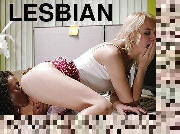 Aroused lesbians use the small office to consume their love for the pussy