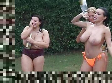 Four babes are getting naked at the poolside