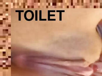 Rubbing pussy on toilet