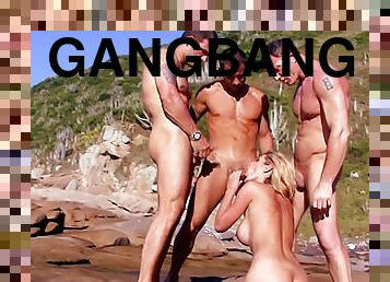 tetas-grandes, al-aire-libre, anal, chorro-de-corrida, polla-enorme, paja, gangbang, sexo-en-grupo, playa, trío