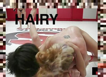 Hairypussy wrestling dyke fights against her rival on mats