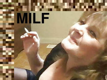 Clothed Milf Smokes and talks dirty