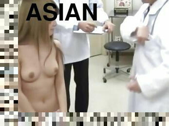 Asian gets her small tits out