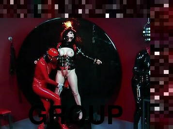 Rubber clad trio dominatrix action