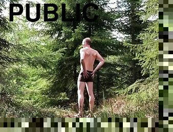 Undressing while walking on a public trail