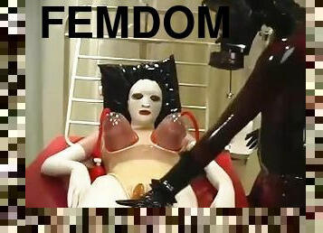 Heavy rubber suction treatment with big tits in clinic room - femdom gasmask mistress and her slave