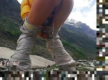 Traveler peeing in mountains - Angel Fowler