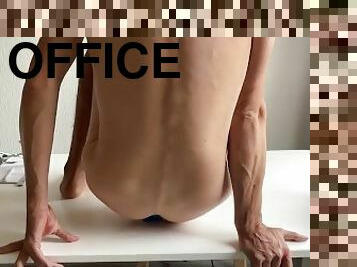 Home office perk: anal play on the desk. Put that dildo in the ass.
