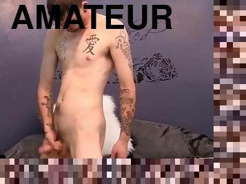 Tattooed young amateur Bob jerks off big cock and cums solo
