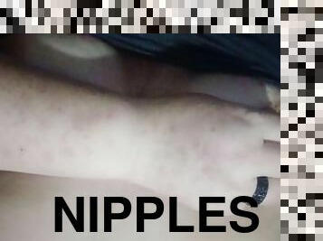 Pinching erect nipples