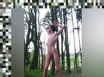 Very very skinny horny teen gets fully naked in the woods and shows his body and takes a piss