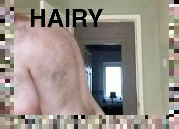Hairy tubby exhibitionist guy working naked