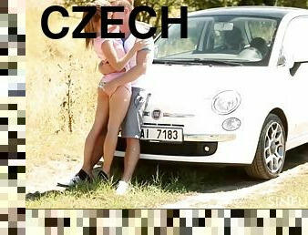 Young Czech couple having romantic outdoor sex in field