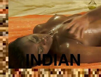 Tanned Indian girl being rubbed in instructional massage film