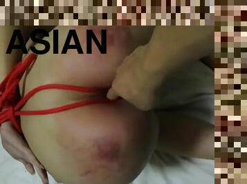 Asian girl spanking and bondage