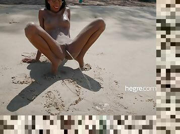 Nude beach ebony babe Striptease and pissing