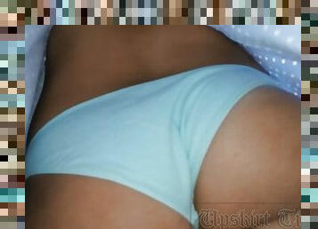 Upskirt tanned beauty in blue panties.