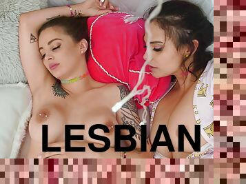 Hot lesbians lie down on each other's faces to lick cunts