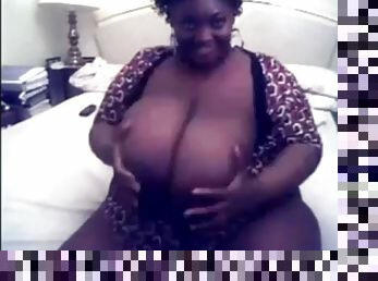 Beautiful voluptuous black woman in a brick house