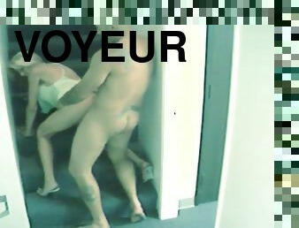 Voyeur milf sex in a stairwell with blonde