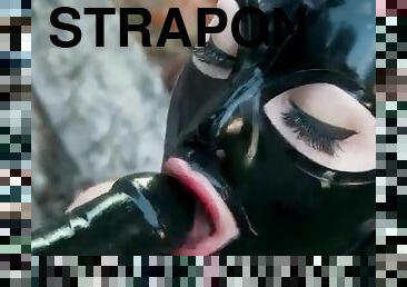 Strapon dildo blowjob in latex fetish video