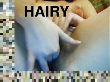 Teen playing with her hairy pussy on cam