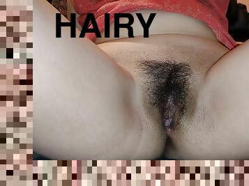 In The Bedroom She Undresses And Fingers Her Hairy Cunt For Pleasure