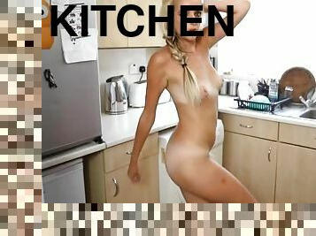 Blonde in her kitchen dancing and stripping to arouse you
