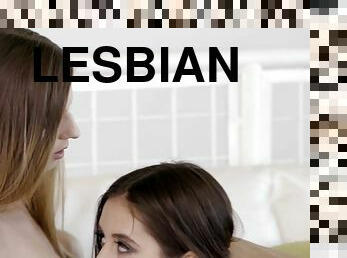 Two glamorous lesbians try out their new sex toy