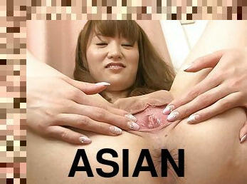 Asian girl shows her pussy