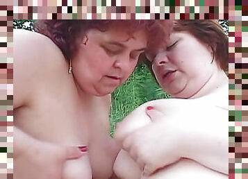 BBW redheads make lesbian love outdoors