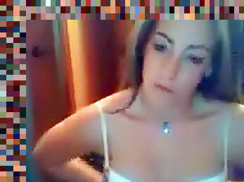 Webcam girl flashes her pierced belly button