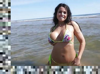 Bikini model topless on the beach