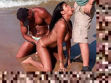Nude busty wife shared by the beach by a pair of younger lovers