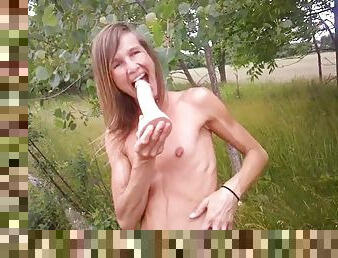 Beautiful skinny teen masturbating outdoors