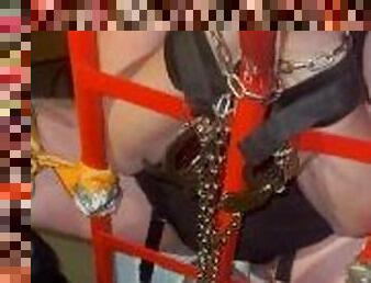 Loud pregnant submissive chained in garage to moving trolley - wand taped to her clit and cums hard