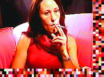 Perverted milf is smoking a cigarette in a hot way