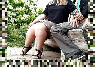 Mother-in-law makes her cum in the park on a bench with the risk of being noticed